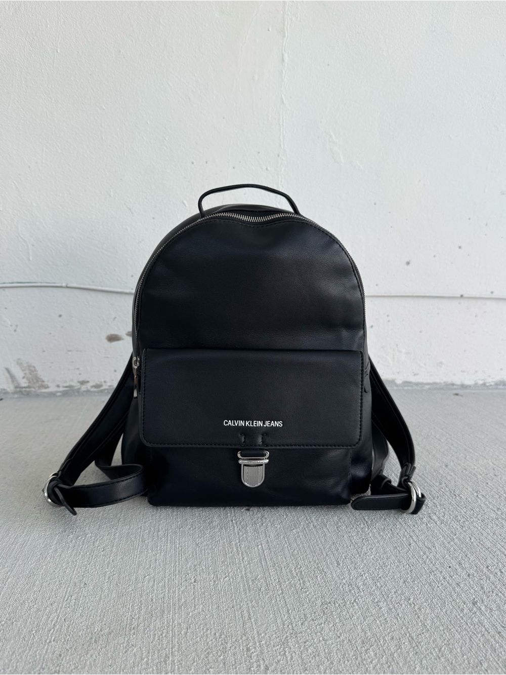 Calvin Klein Jeans Black Mini Leather Backpack with Front Pocket
